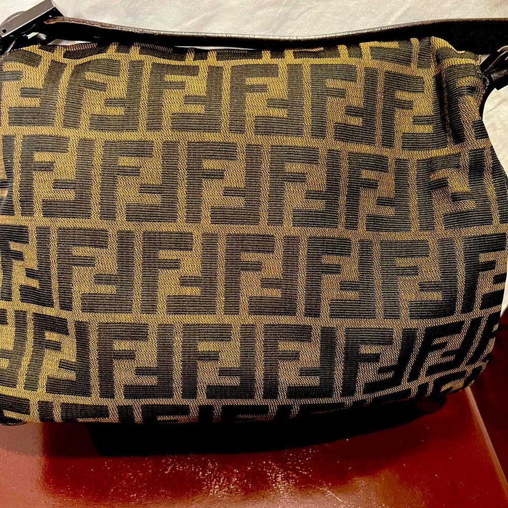 Fendi. Authentic leather strap canvas